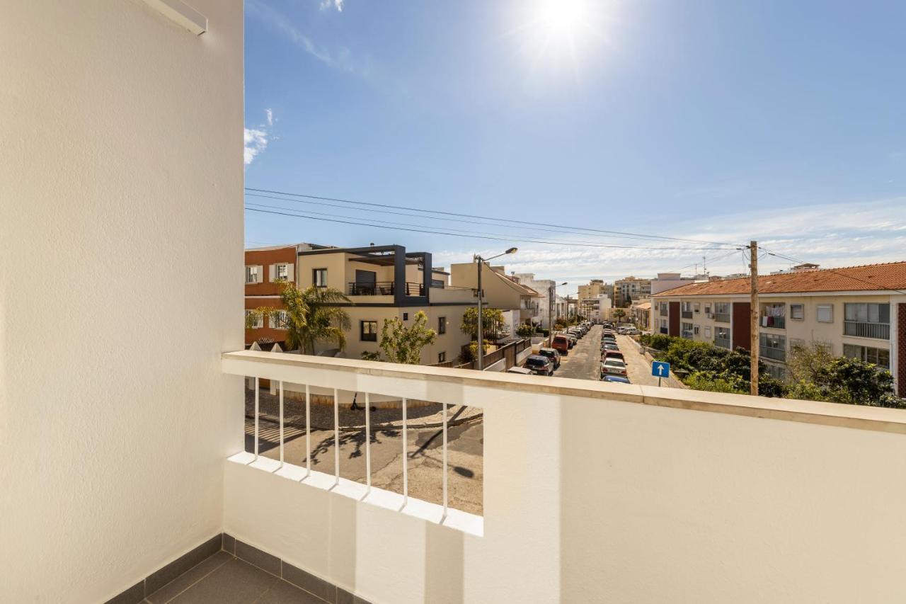 RG Sunny Ap Apartment Faro Bagian luar foto